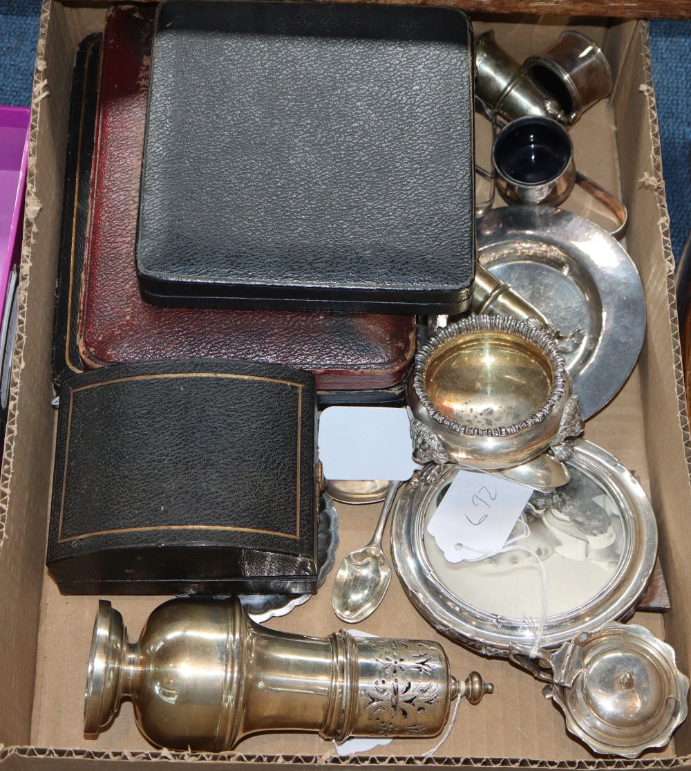 A silver sugar caster, a four-piece silver cruet set etc.